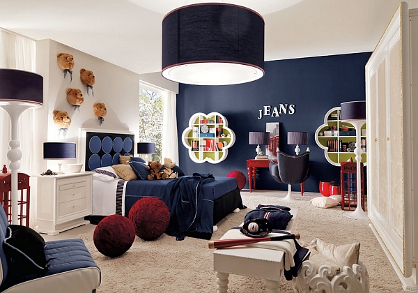 Gorgeous dark blue accent wall enlivens the room