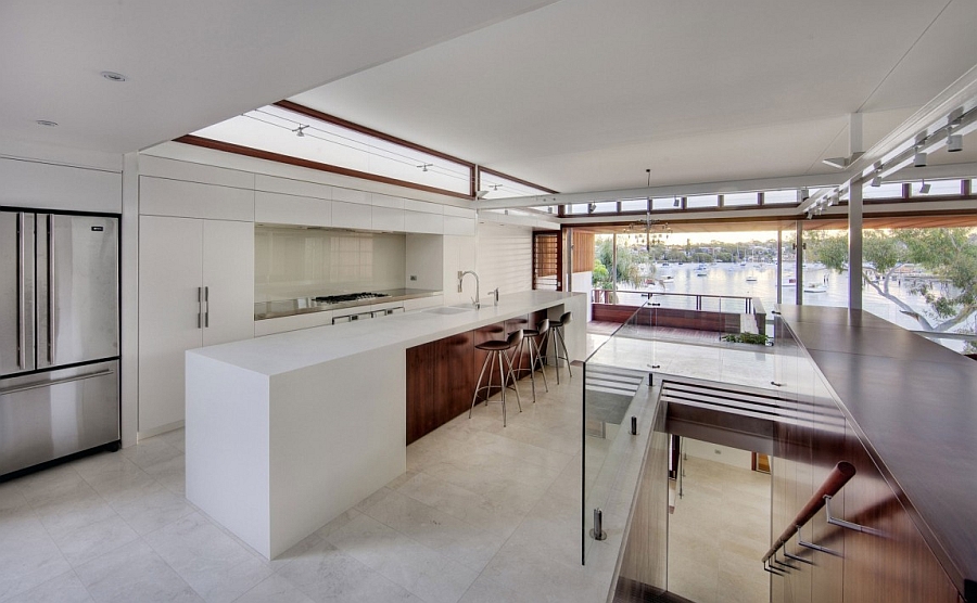 Gorgeous modern kitchen with large island in white