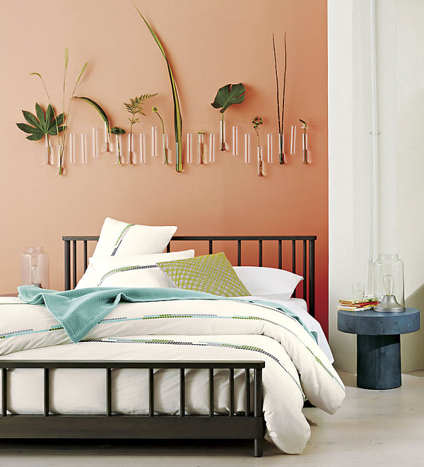 Green accents in a peach bedroom