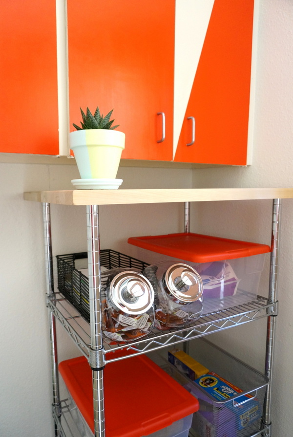 Industrial-style shelving in a modern laundry room