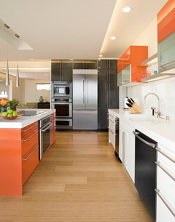 Kitchen cabinet color scheme that brings together orange, white and black