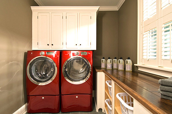 Laundry room with cabinet and under-counter shelving