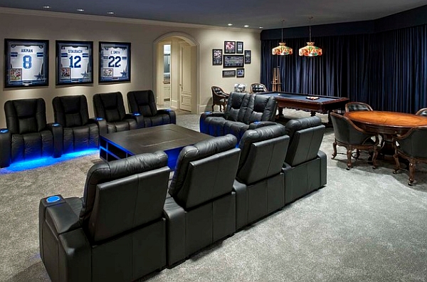 Luxurious media room with framed sports jerseys