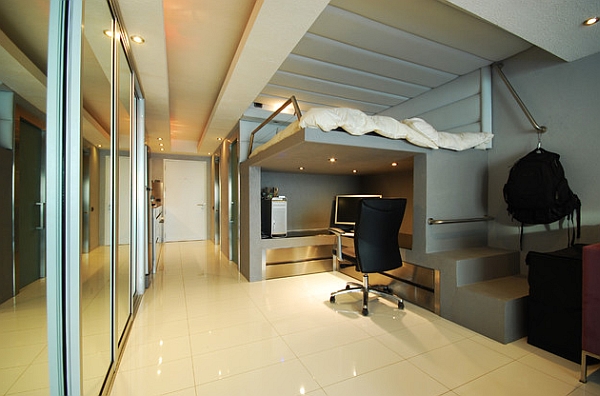 Modern minimalist loft bed with a stylish work area underneath