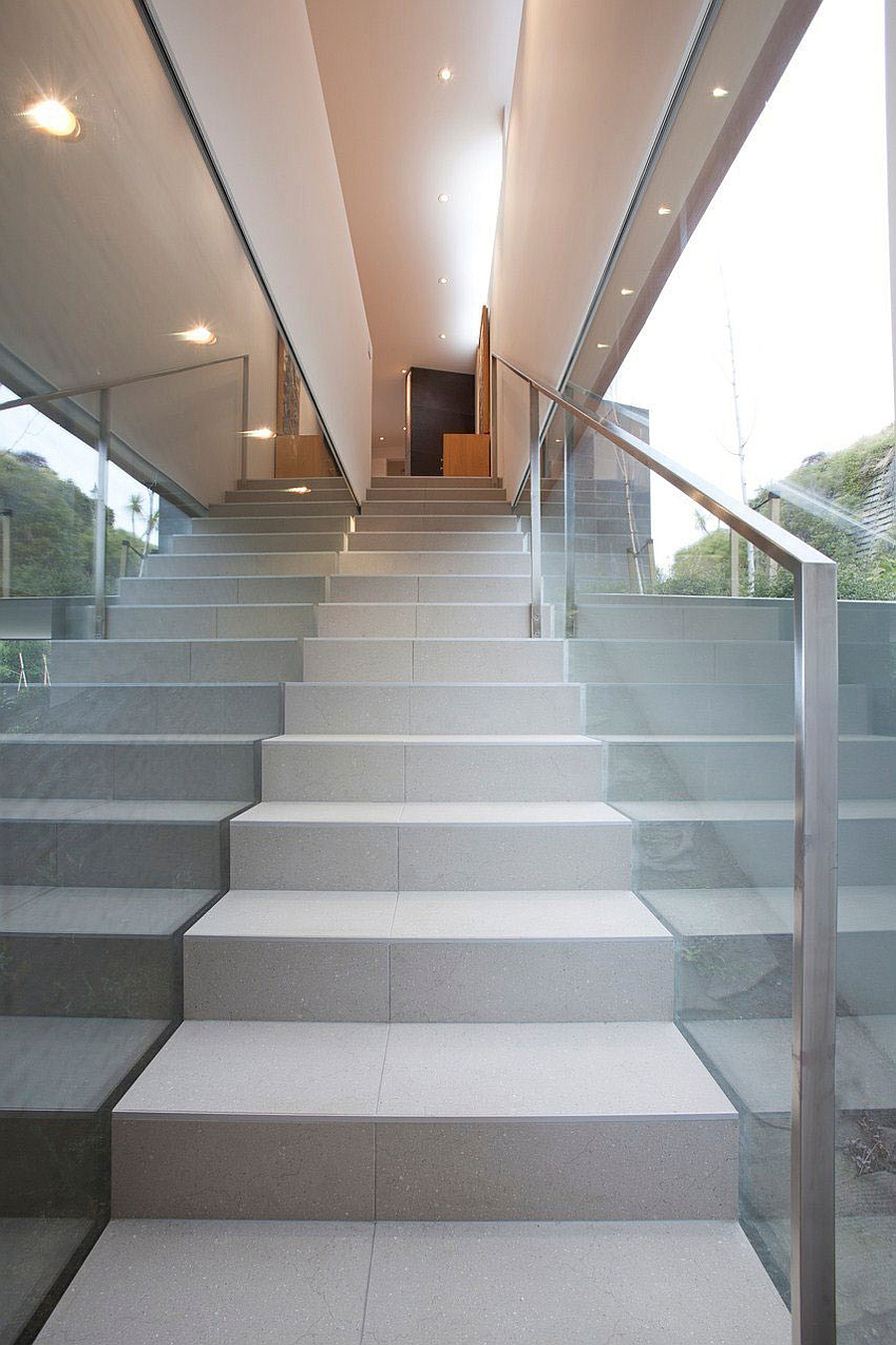 Modern staircase with glass railing