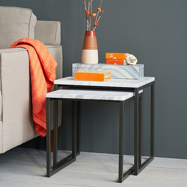 Orange accents in a charcoal room