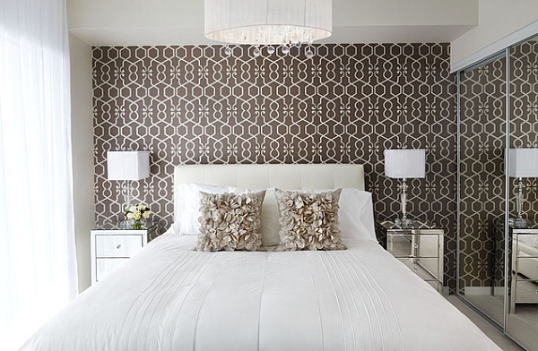 Patterned wallpaper in the white bedroom adds both color and style