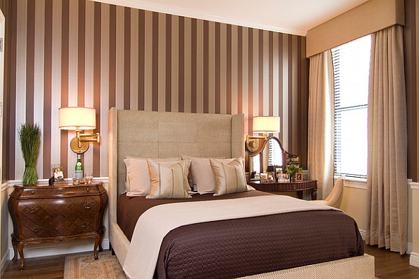 Silver and brown stripes blend in with the color scheme of the bedroom