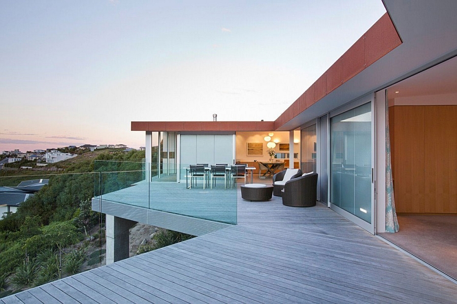 Spacious terrace with glass railing and ocean views