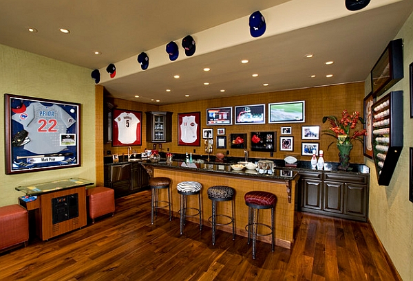 Sports Memorabilia adorns the walls of this home bar