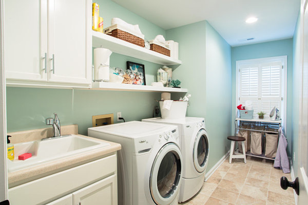 Storage and decor on laundry room shelves