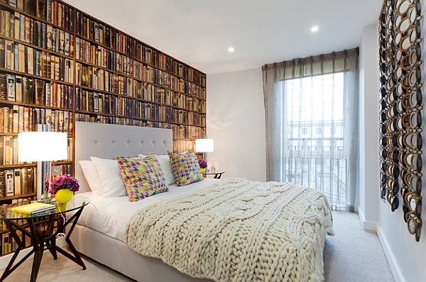 The library wallpaper sure add an erudite look to the bedroom!