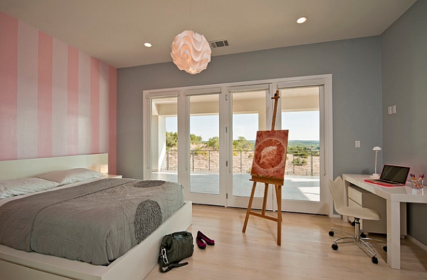 Vertical pink stripes add chic glam to the room