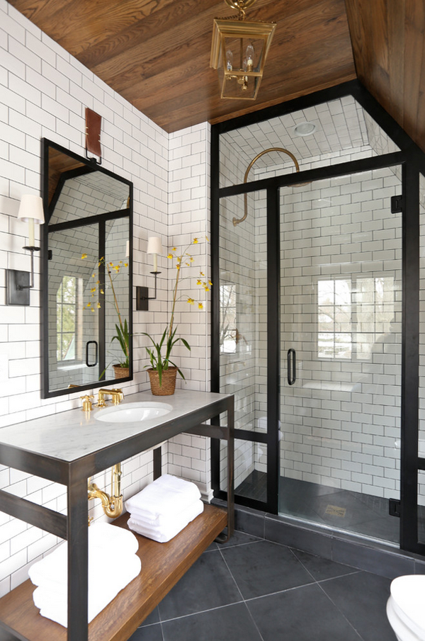 brass and subway tile bath