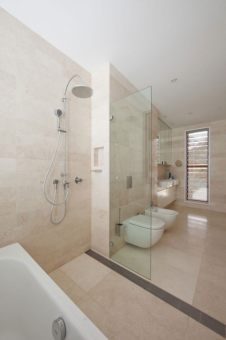 contemporary bath with a glass shower area