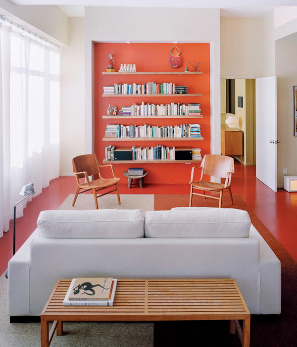 Beautiful living room with a pop of Orange