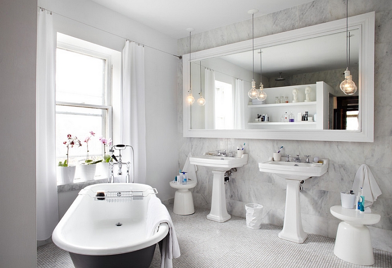 Beautiful contemporary bath with twin Martini side tables in white