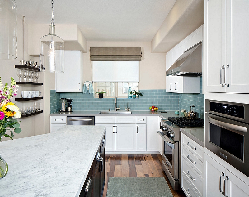 Blue glass subway tile backsplash brings with it a hint of gray