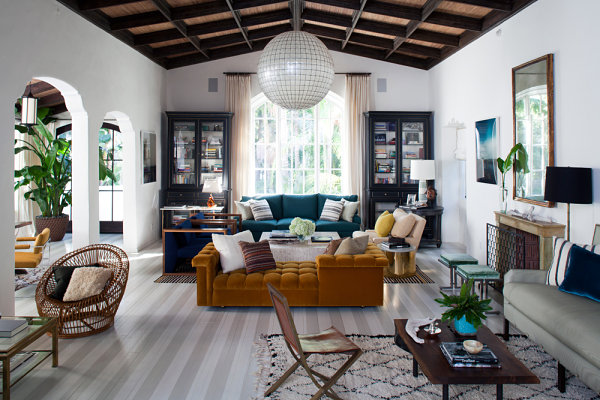 Blues, greens and neutrals in a living room designed by Nate Berkus