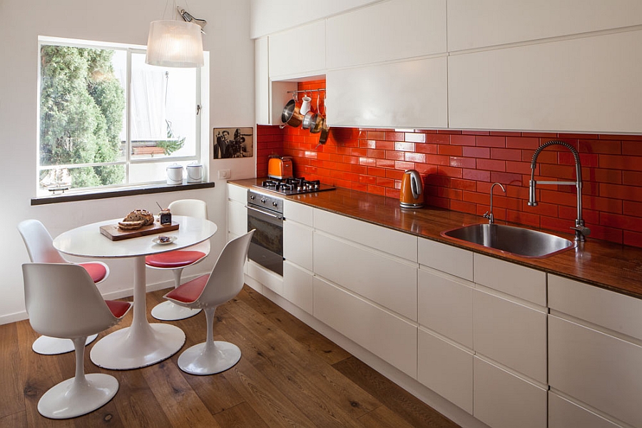 Bright orange backsplash in the kitchen