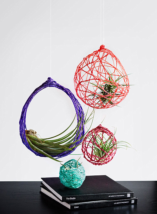 Colorful yarn hanging planters