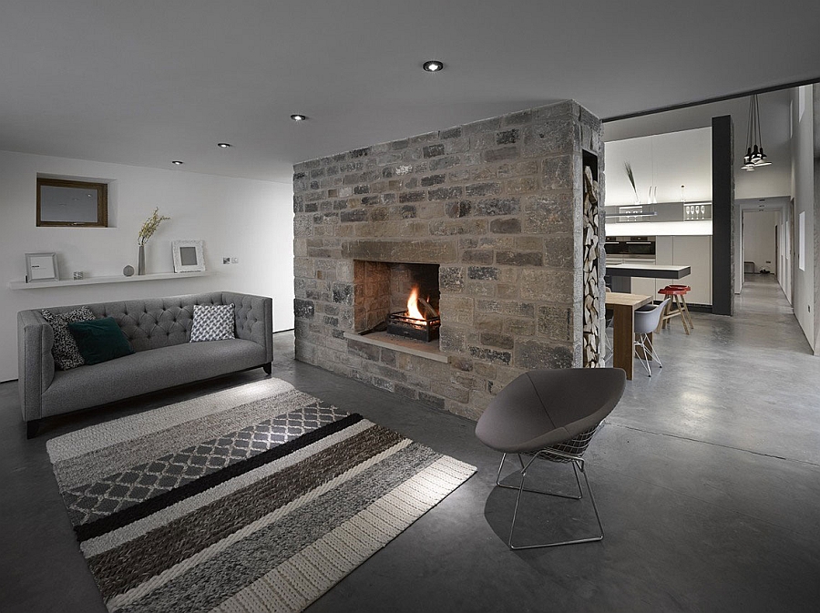 Cozy stone fireplace has a traditional appeal