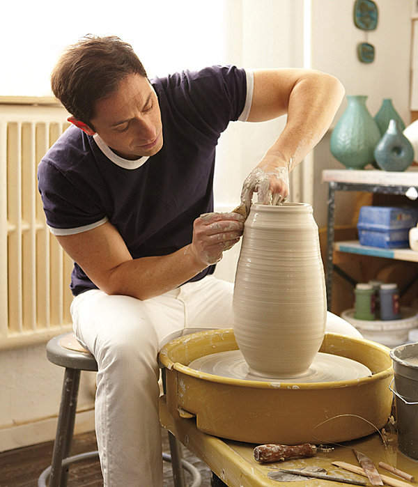 Designer Jonathan Adler at the potter's wheel