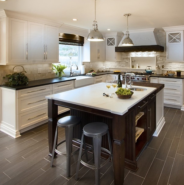 Ergonomic kitchen island design helps in tucking away the bar stools