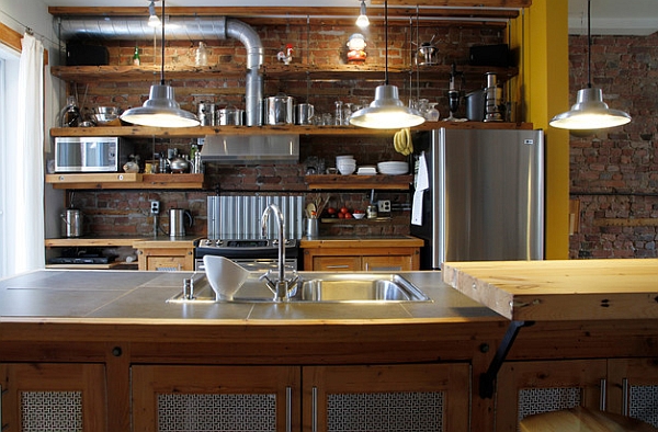 Exposed brick wall and steel surfaces usher in the industrial appeal