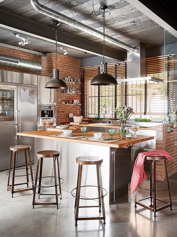 Exposed brick walls in the industrial kitchen