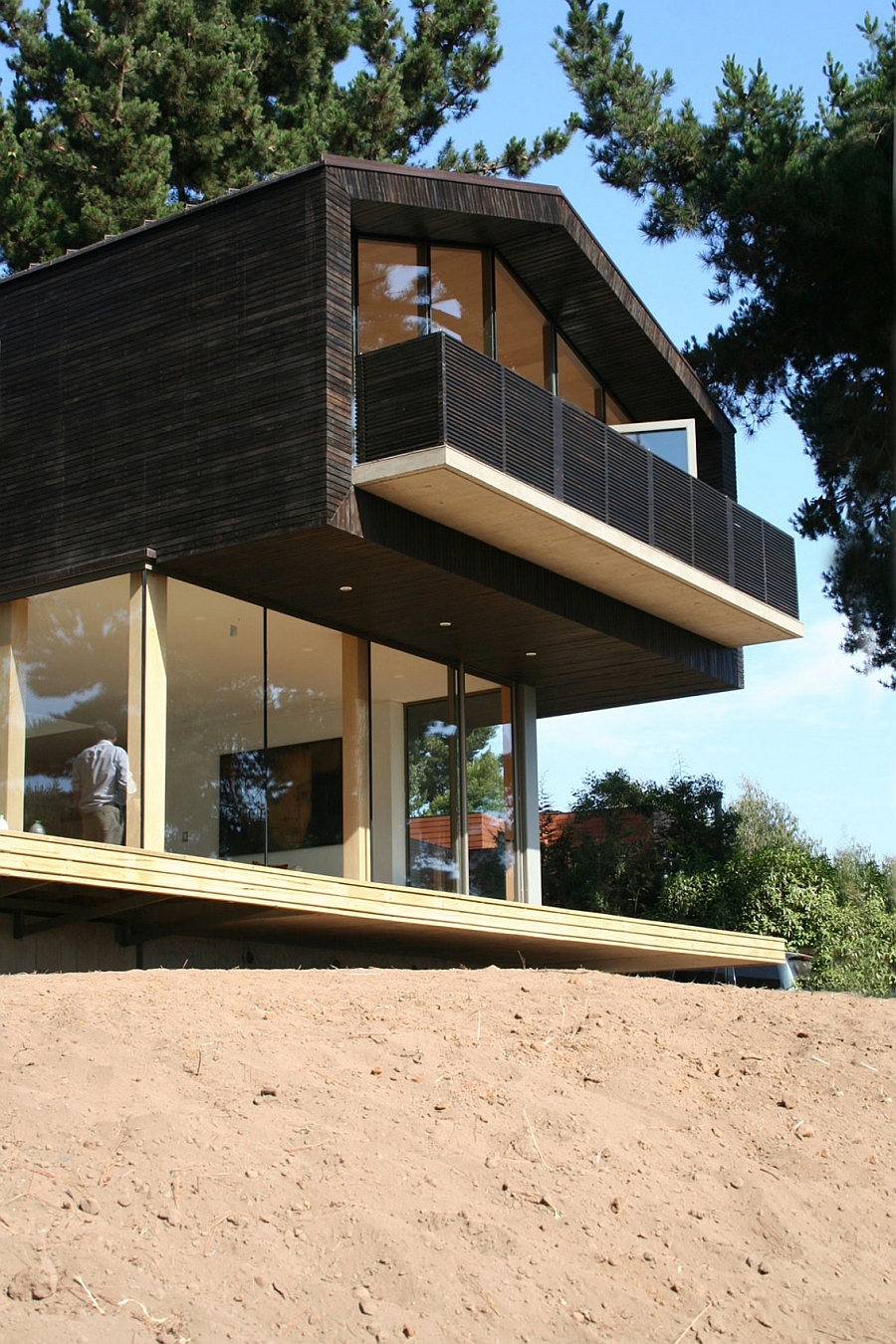 Exterior clad in glass and wood