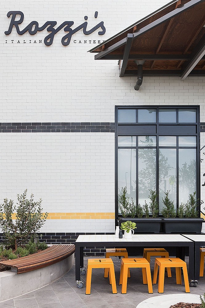 Exterior of the restaurant clad in white