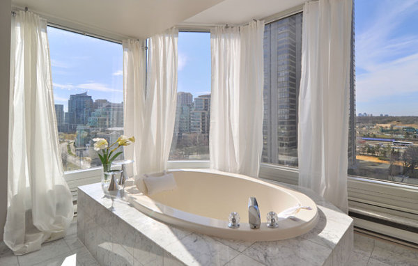 Glamorous bathroom with marble tile