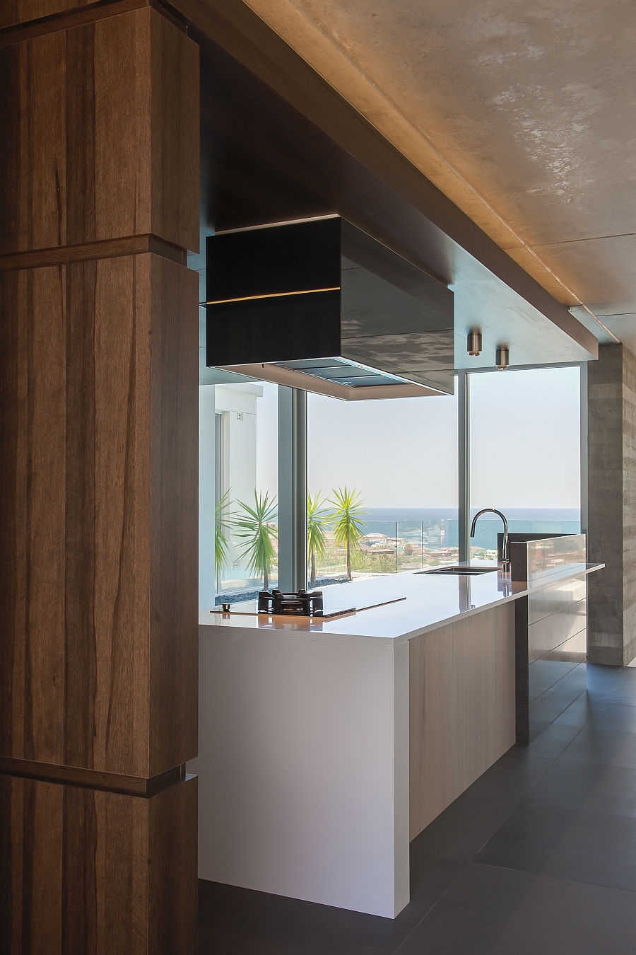 Glass walls offer view of the Bondi beach from the kitchen