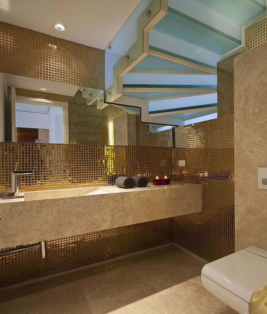 Glittering golden tiles in the bath