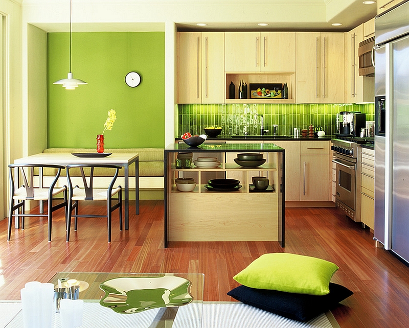 Green makes its presence felt in this lovely modern kitchen