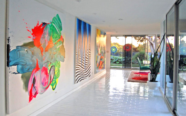 Hallway with mirrored closet doors