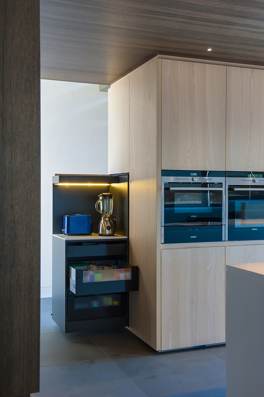 Hidden shelves that emerge out at the press of a button