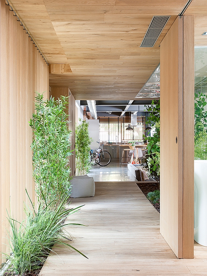 Indoor corridor draped in wood