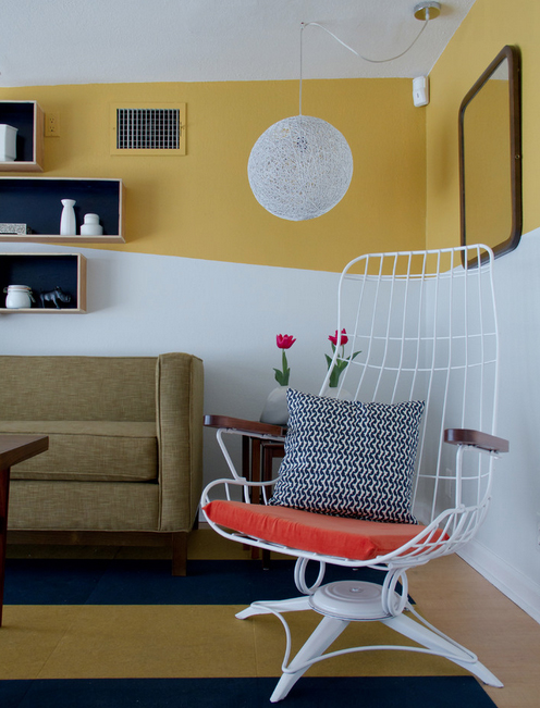 King-sized wired office chair with colorful cushions