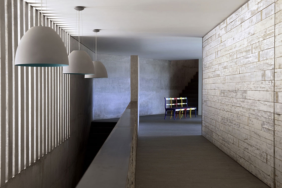 Large pendant lights illuminate the corridors