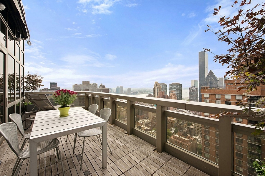 Large terrace with views of East River and New York City Skyline