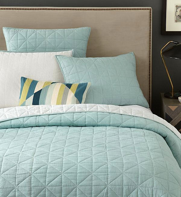 Light blue coverlet and shams