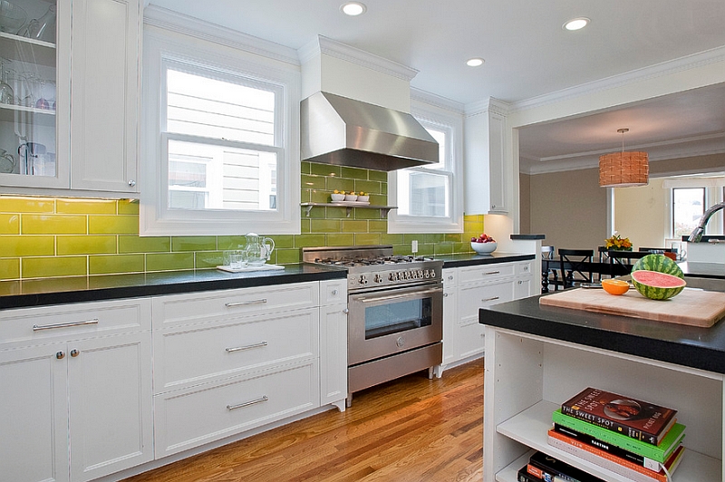 Lighting creates the ombre effect in this kitchen backsplash