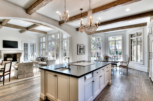 Lovely chandeliers light up this Transitional kitchen in Houston