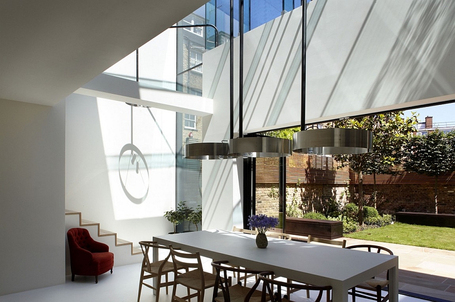 Lovely dining area with wishbone chairs at the table