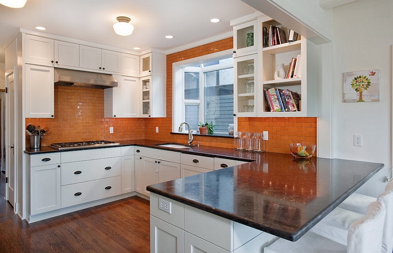 Lovely use of orange and white in the kitchen