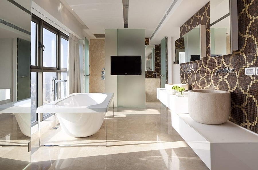 Luxurious bath with freestanding tub and custom floating vanities