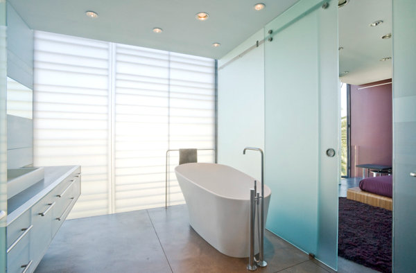 Metal towel rack in a minimalist bathroom