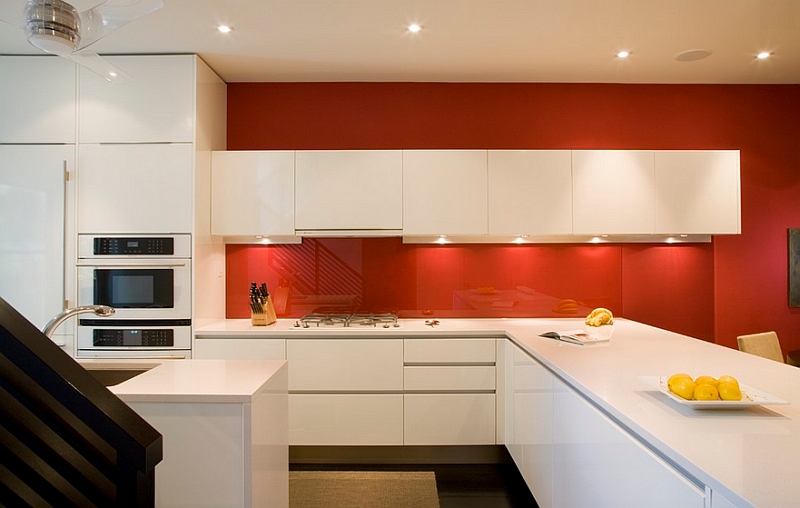 Minimalist kitchen in white and orange